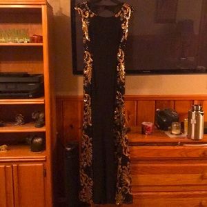 Long black dress with pretty designs on the side